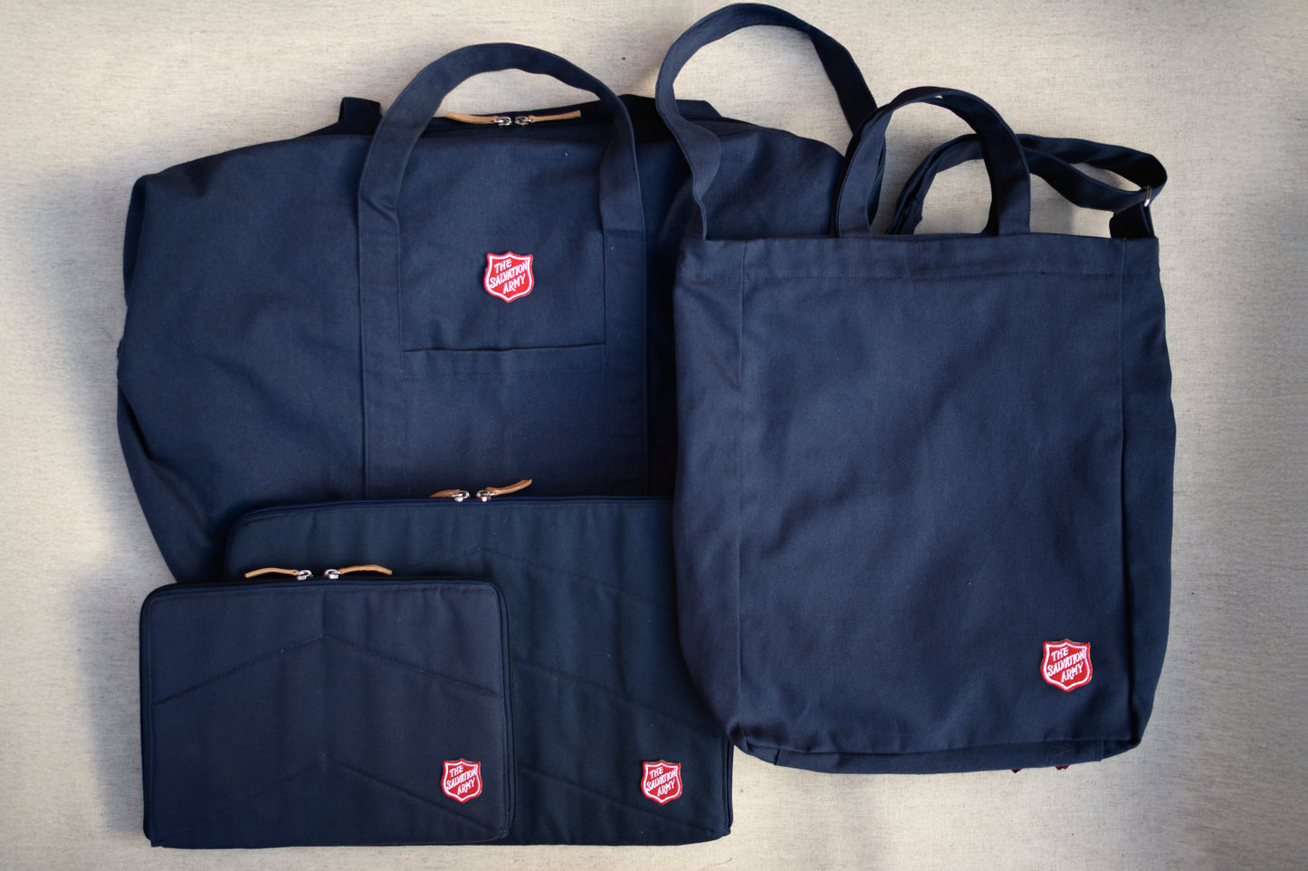 Tablet sleeve, navy, with Shield