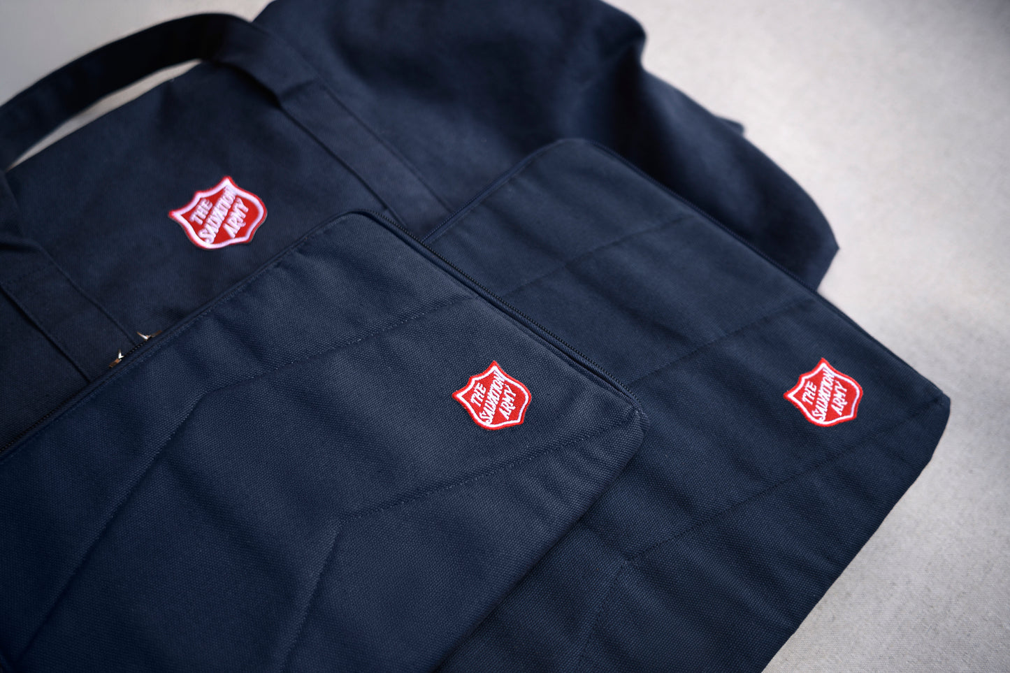 Tablet sleeve, navy, with Shield