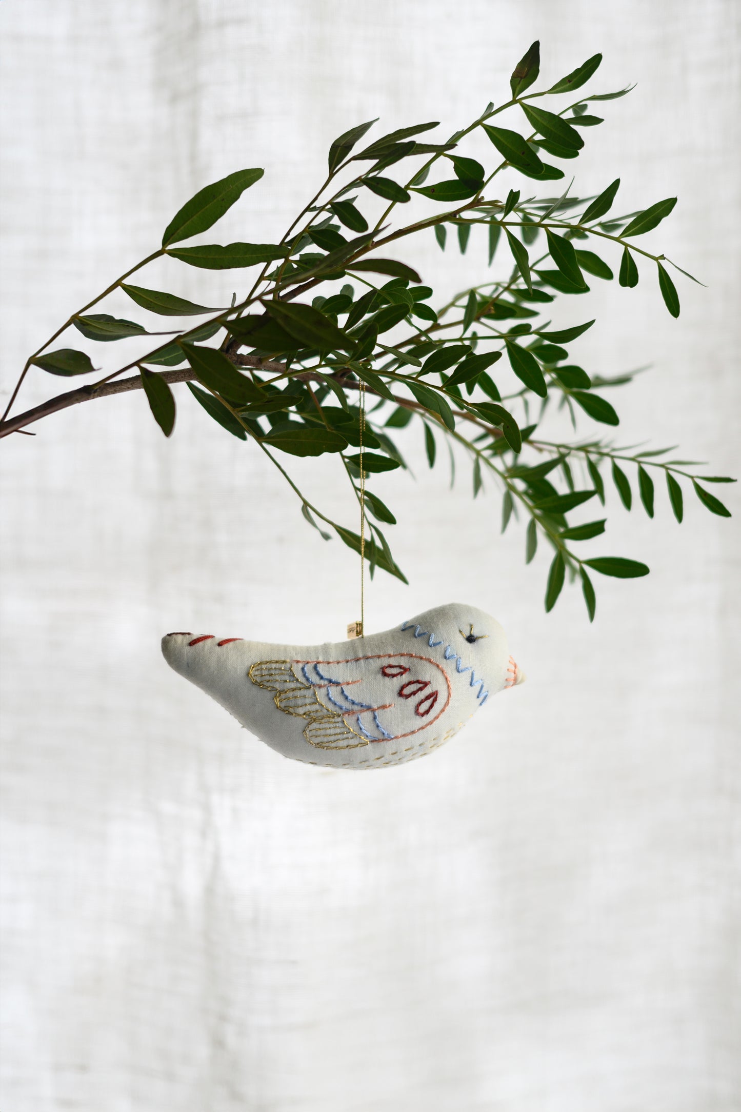 Embroidered bird