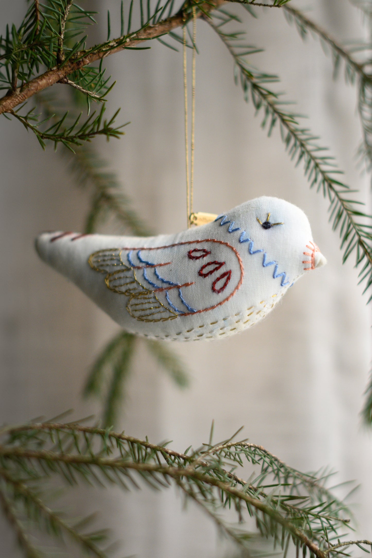 Embroidered bird
